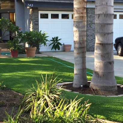 Front yard landscaping ideas landscape lawn artificial grass, synthetic turf, garden flowers palm trees, garage door, driveway