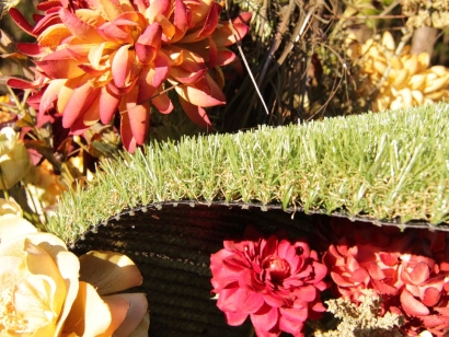 Synthetic grass, artificial turf, artificial plants flowers red white rose green olive brown turf backing drainage flowers background