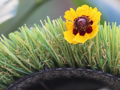 artificial grass olive green emerald green with yellow red flower