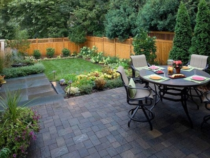 Backyard before, patio, chairs, wooden fence