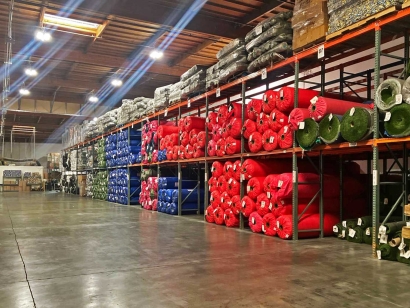 Synthetic Turf warehouse, Global Syn-Turf artificial grass storage, turf rolls shelving