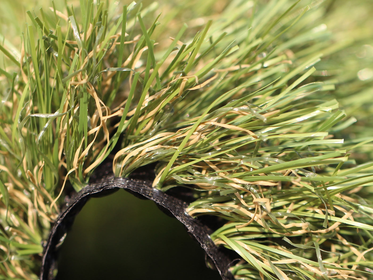 All Natural 75 oz Artificial Grass. Field Green, Olive Green colors. brown and green thatching.