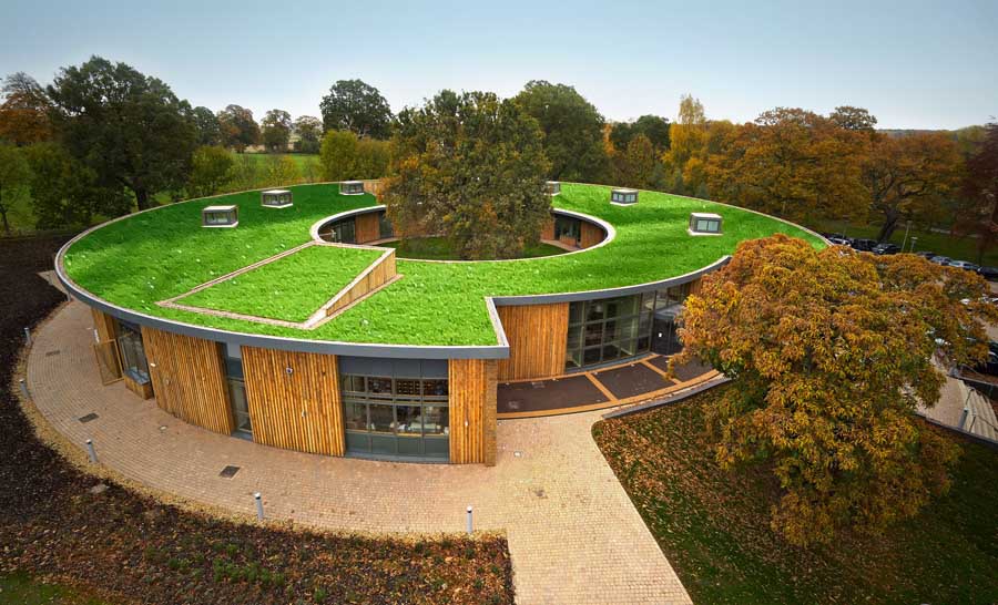 artificial grass rooftop,green roof,greenery roof,round building,artificial grass,synthetic turf,tree roof,roof garden,fake grass